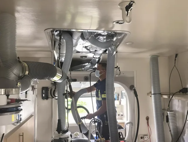 Southborough Air Duct Cleaning specialist performing precise mobile home duct cleaning in Southborough