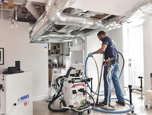 Southborough Air Duct Cleaning technician performing advanced pure duct cleaning with specialized equipment in Southborough