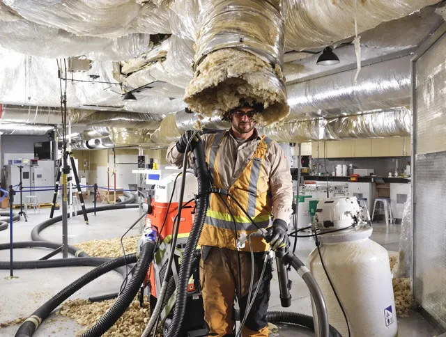 Professional vacuum insulation removal by Southborough Air Duct Cleaning expert in Southborough